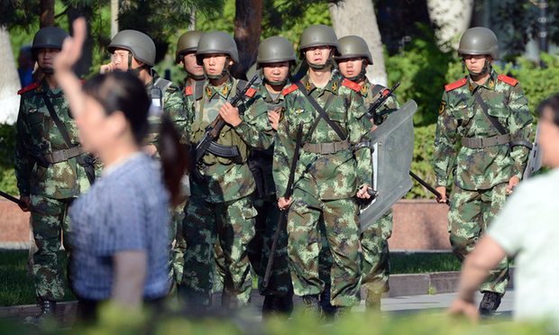 Chinese troops stage show of force in Xinjiang and vow to ‘relentlessly beat’ separatists