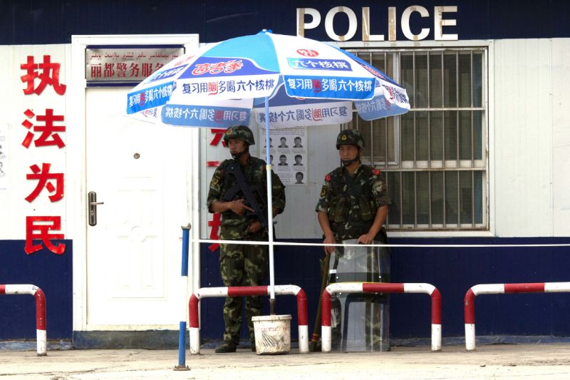 Restive Chinese region offers rewards to recruit more police