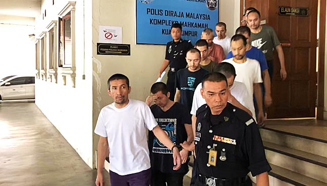 11 Uighurs appeal to AGC to drop charges on illegal entry