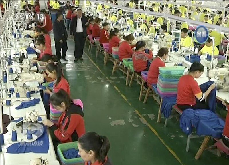 Minorities held in China sew clothes that can end up in US