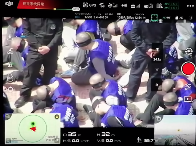 ‘Deeply disturbing’ footage surfaces of blindfolded Uyghurs at train station in Xinjiang