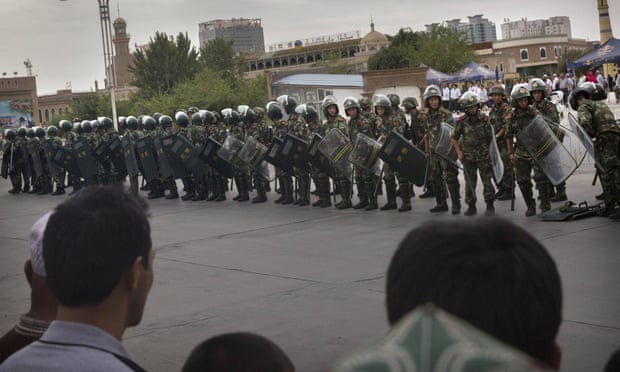 The Guardian view on Xinjiang, China: forced labour and fashion shows