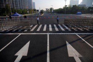 Policemen secure the road near the venue of the G20 Summit in Hangzhou, Zhejiang province